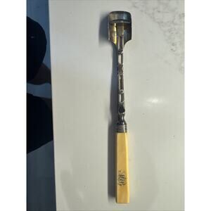 Antique cheese scoop